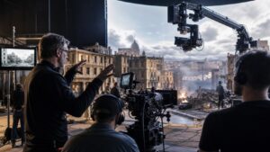 VFX supervisor and camera crew coordinating specialized technology on a blockbuster soundstage
